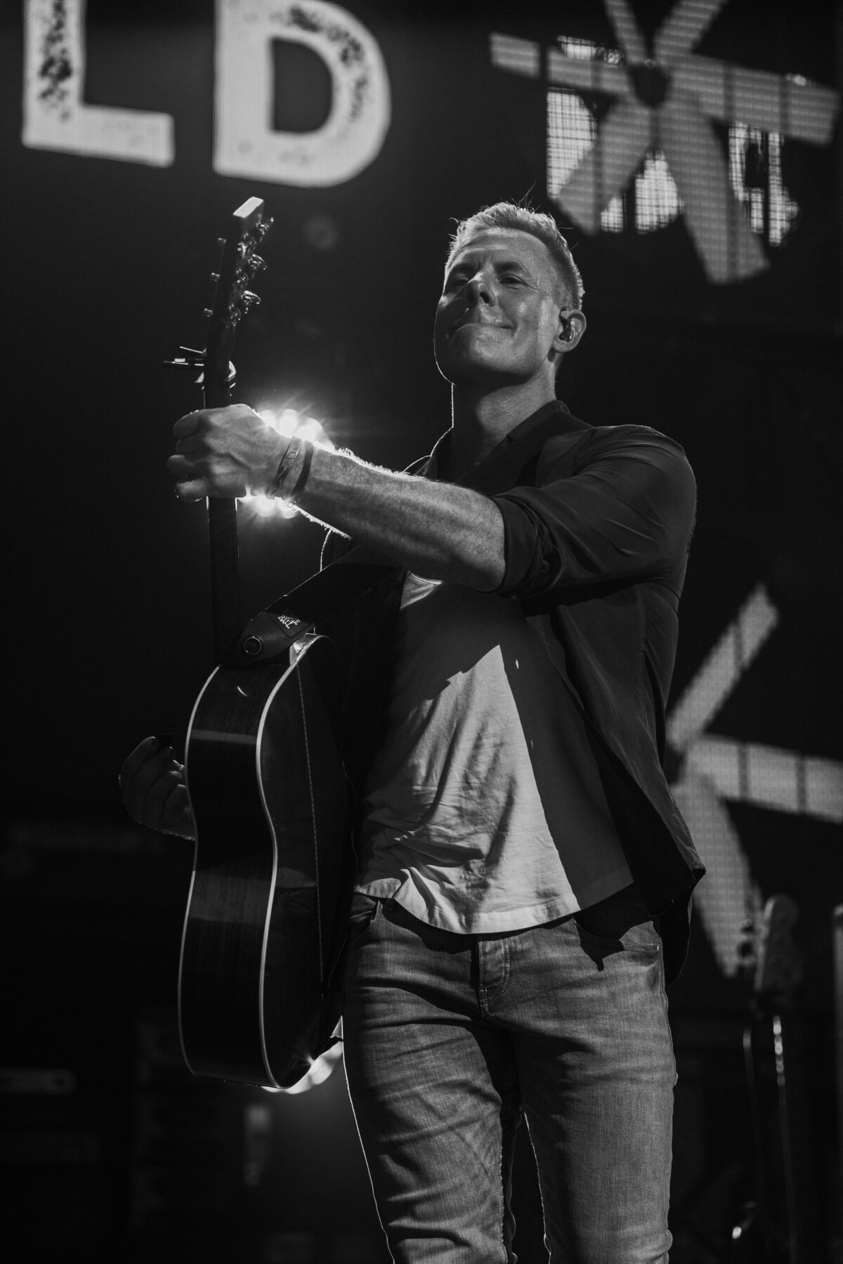 Trevor Rosen  playing guitar during Old Dominion concert