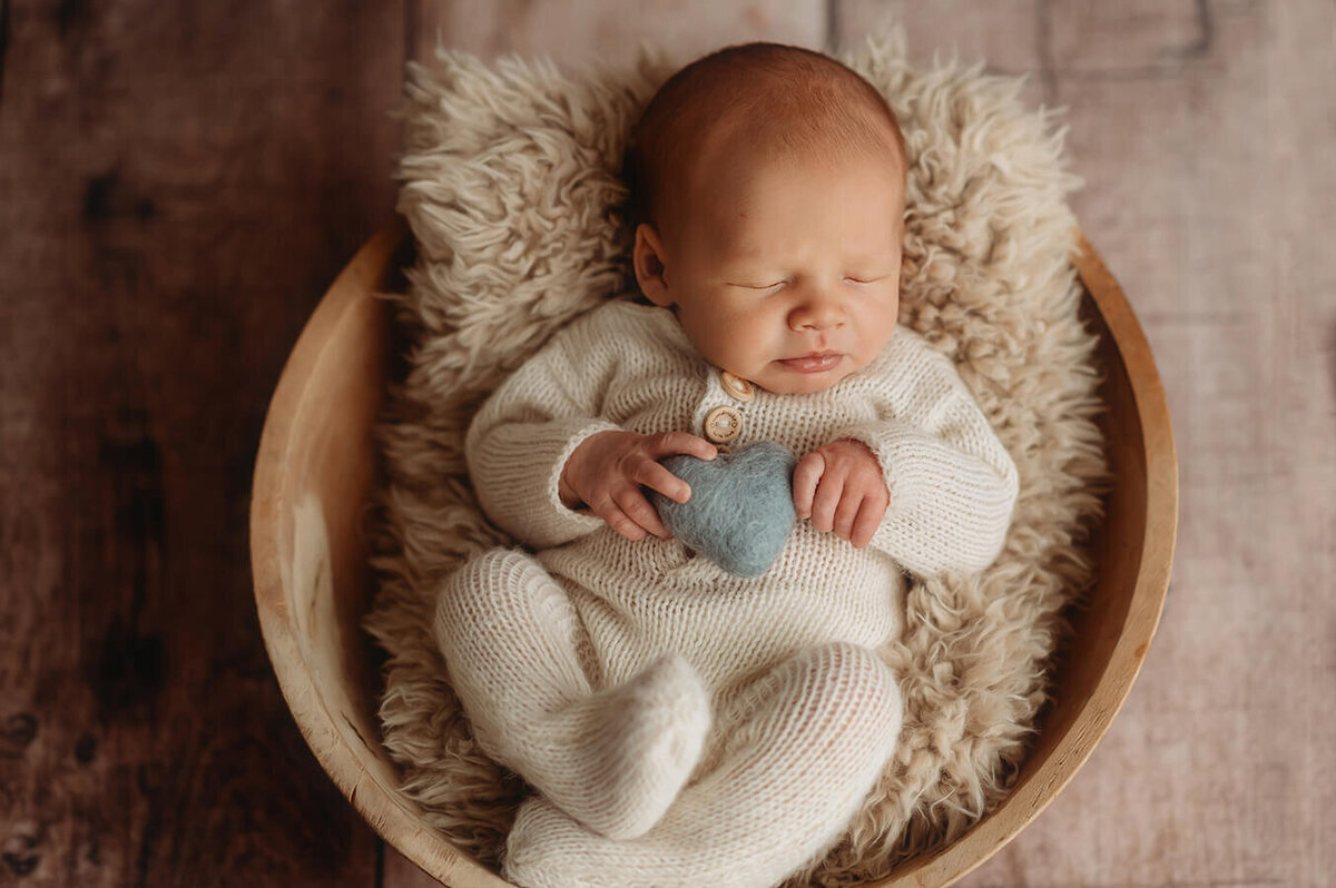 Baby posed for Newborn Photos in Asheville.