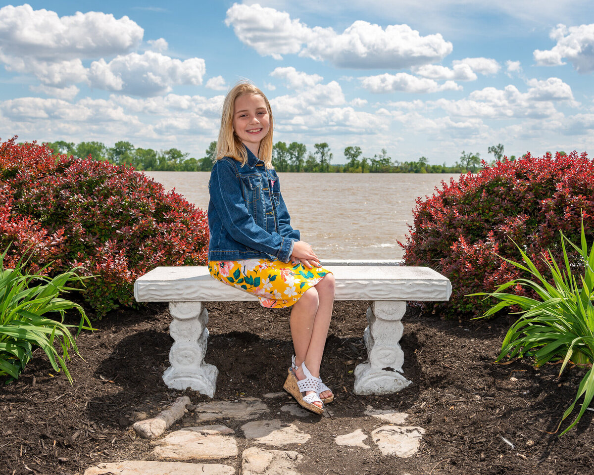 girl_on_a_stone_benchjpg