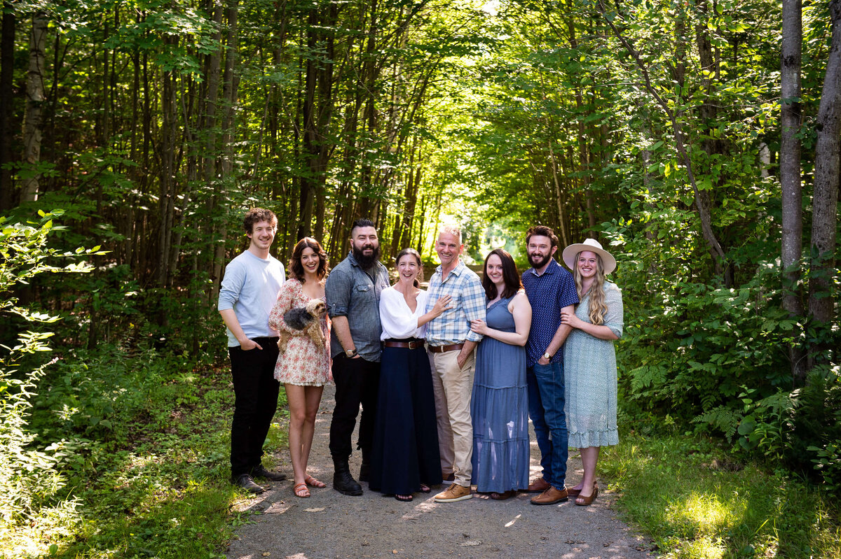 blended family photo taken outdoors in the woods by Ottawa family photographer JEMMAN Photography