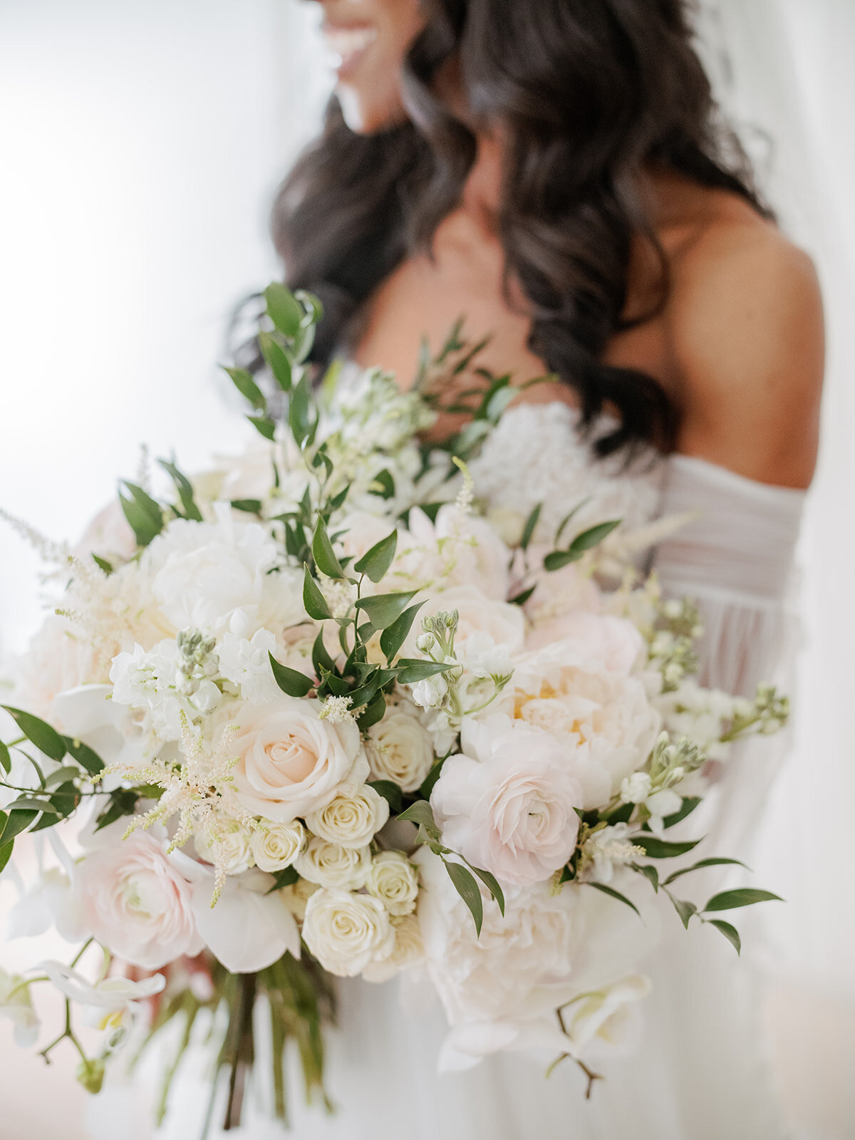 black-bride-holdding-lush-romantic-bouquet-tinted-events-Elizabeth-Austin-Photography