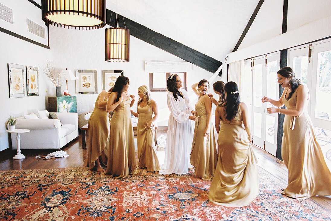 Bridesmaids getting ready portraits with bride at a destination wedding