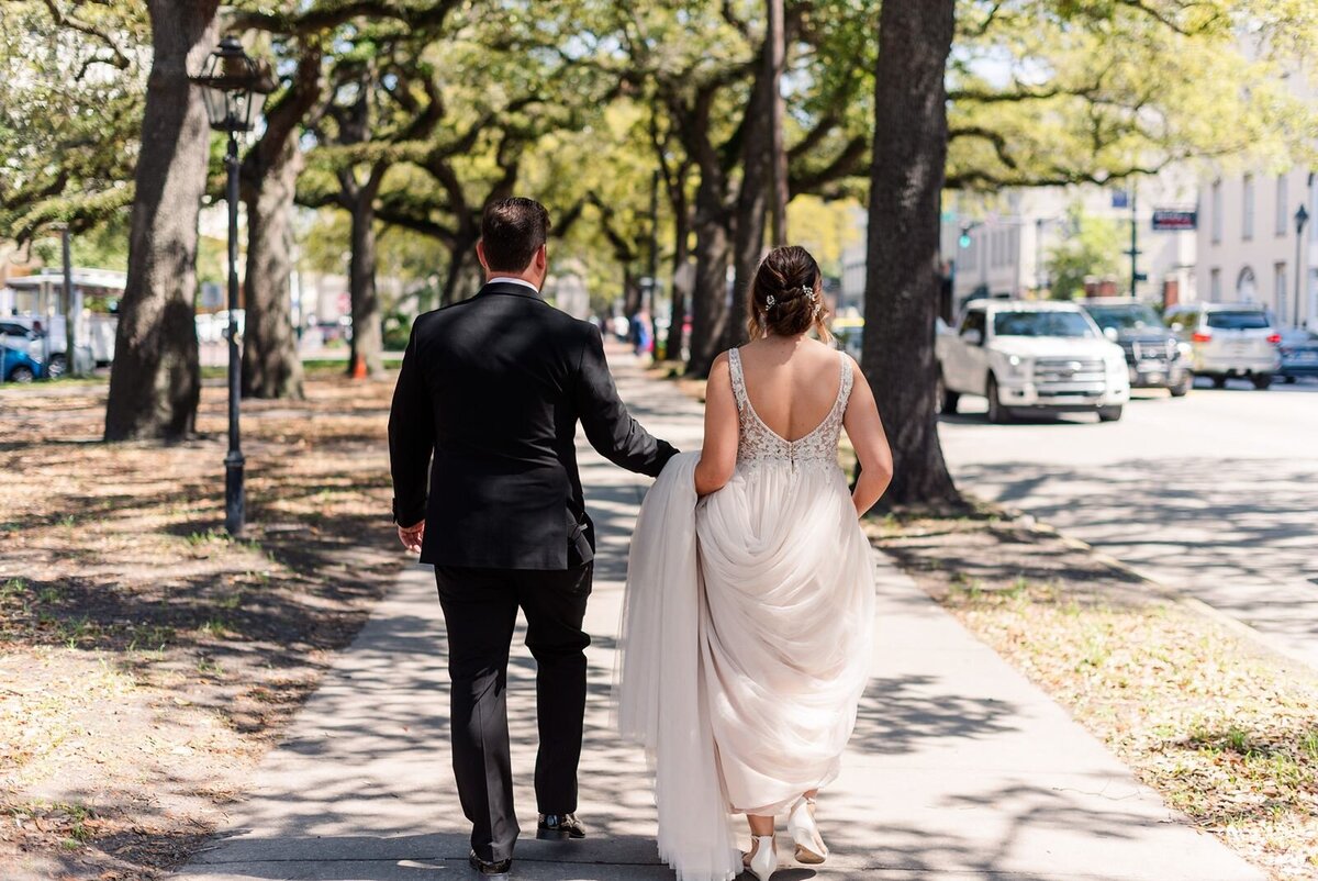 Bride and Groom walking to reception Savannah Georgia