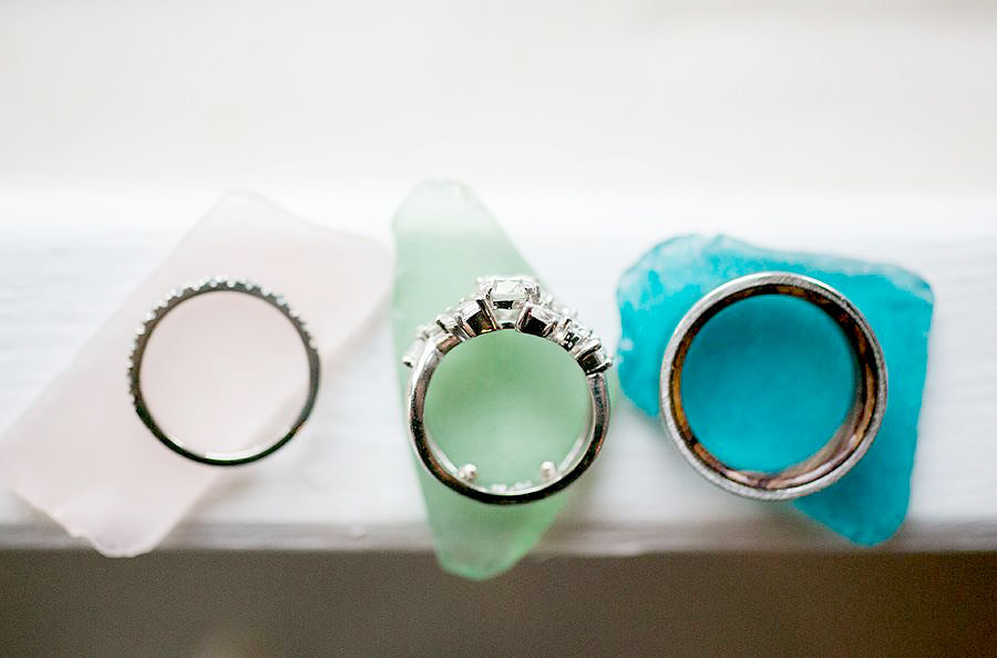 wedding rings on sea glass