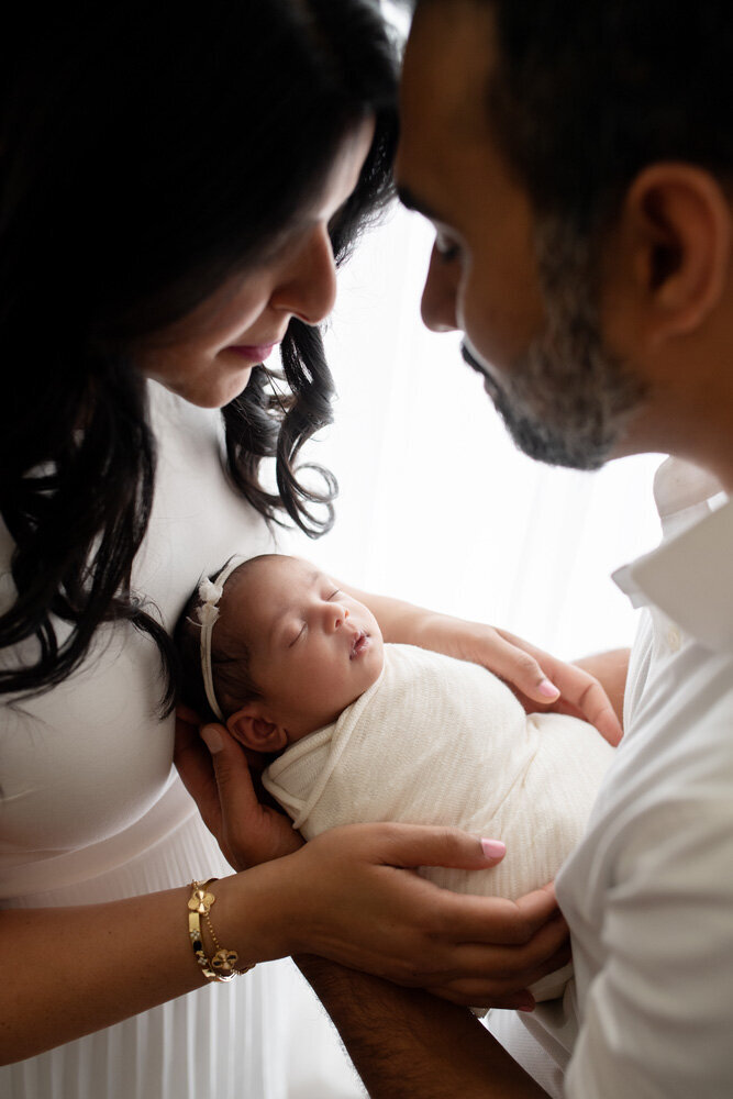 Newborn session of baby girl with parents