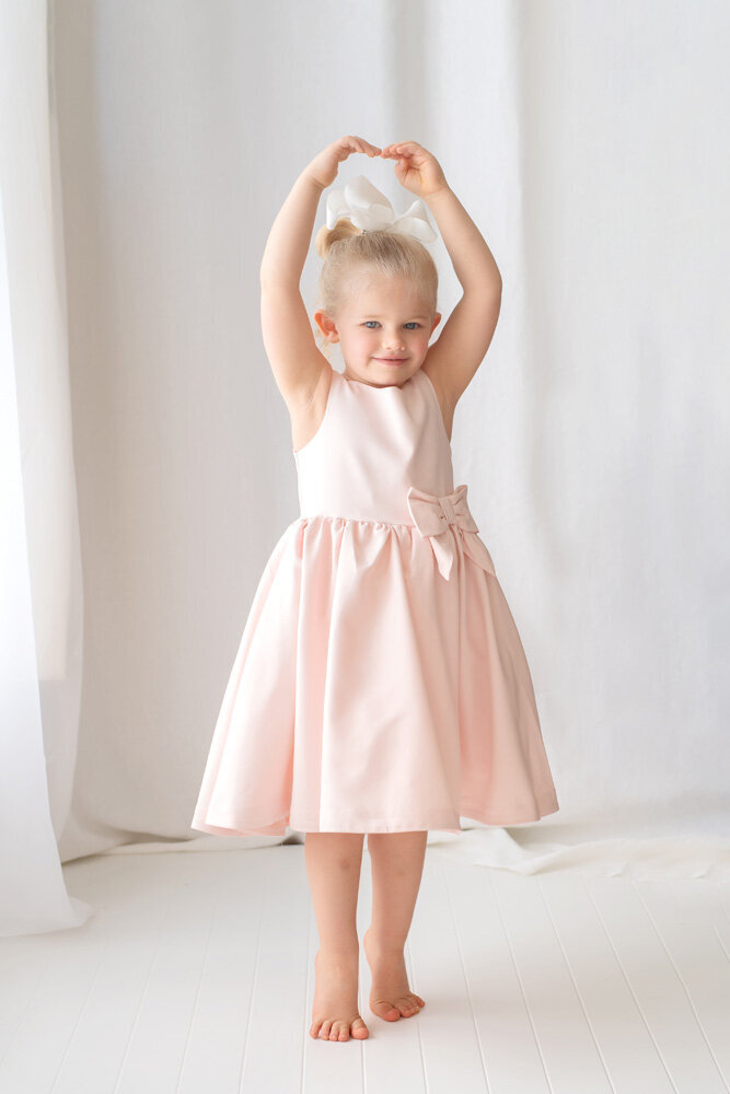 Little girl posing for family session