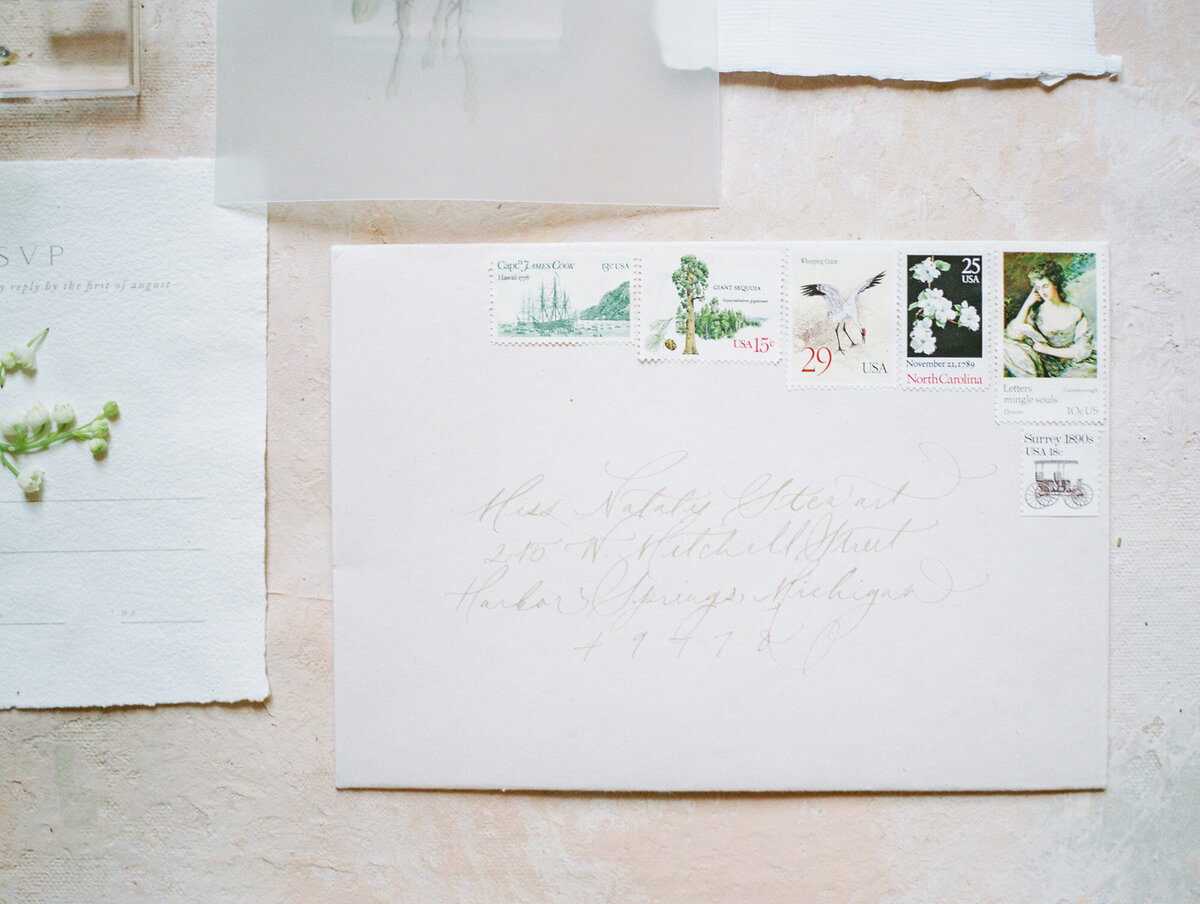 A calligraphy addressed envelope with vintage stamps by Chattanooga wedding photographer, Kelsey Dawn Photography