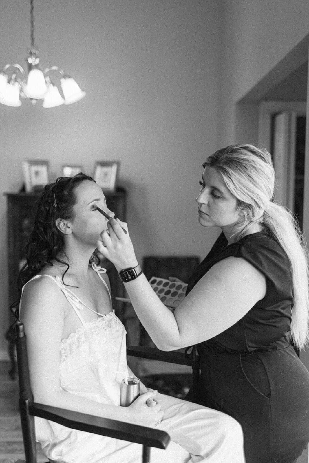 bride-getting-makeup-done