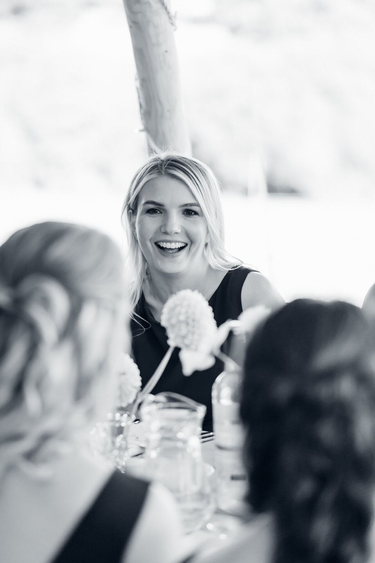 cotswold-wedding-photographer-guests-enjoying-speeches