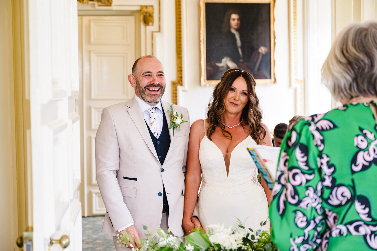 Couple during intimate wedding ceremony at stapleford park