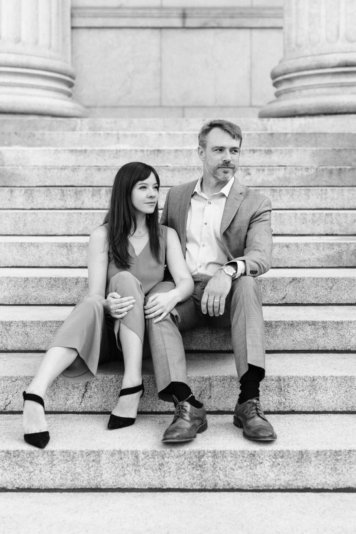 couple sitting on grand staircase at minneapolis institute of art