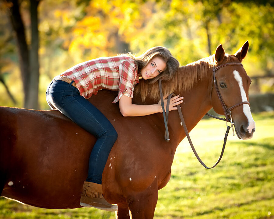 girl on horseback in sunlight