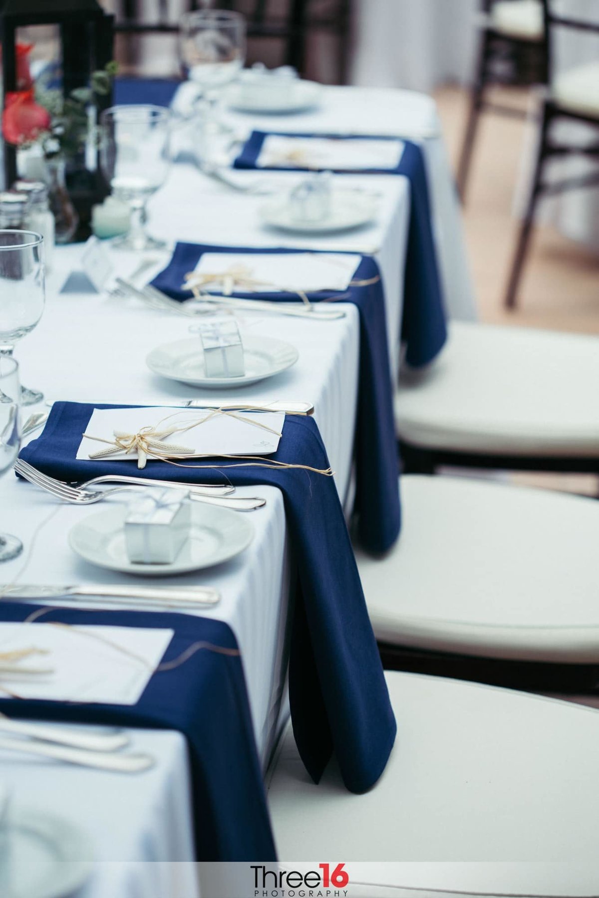 Blue and white table decor for wedding reception