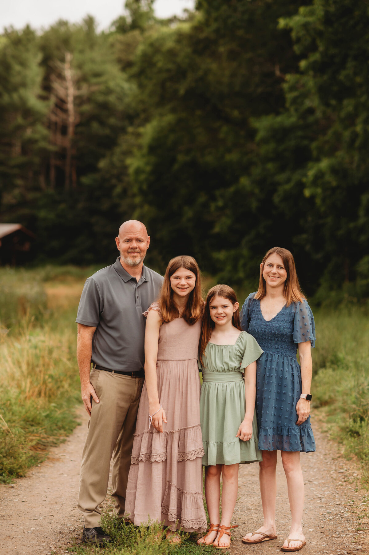 Family poses for Family Photos during an Extended Family Portrait Session in Asheville, NC.