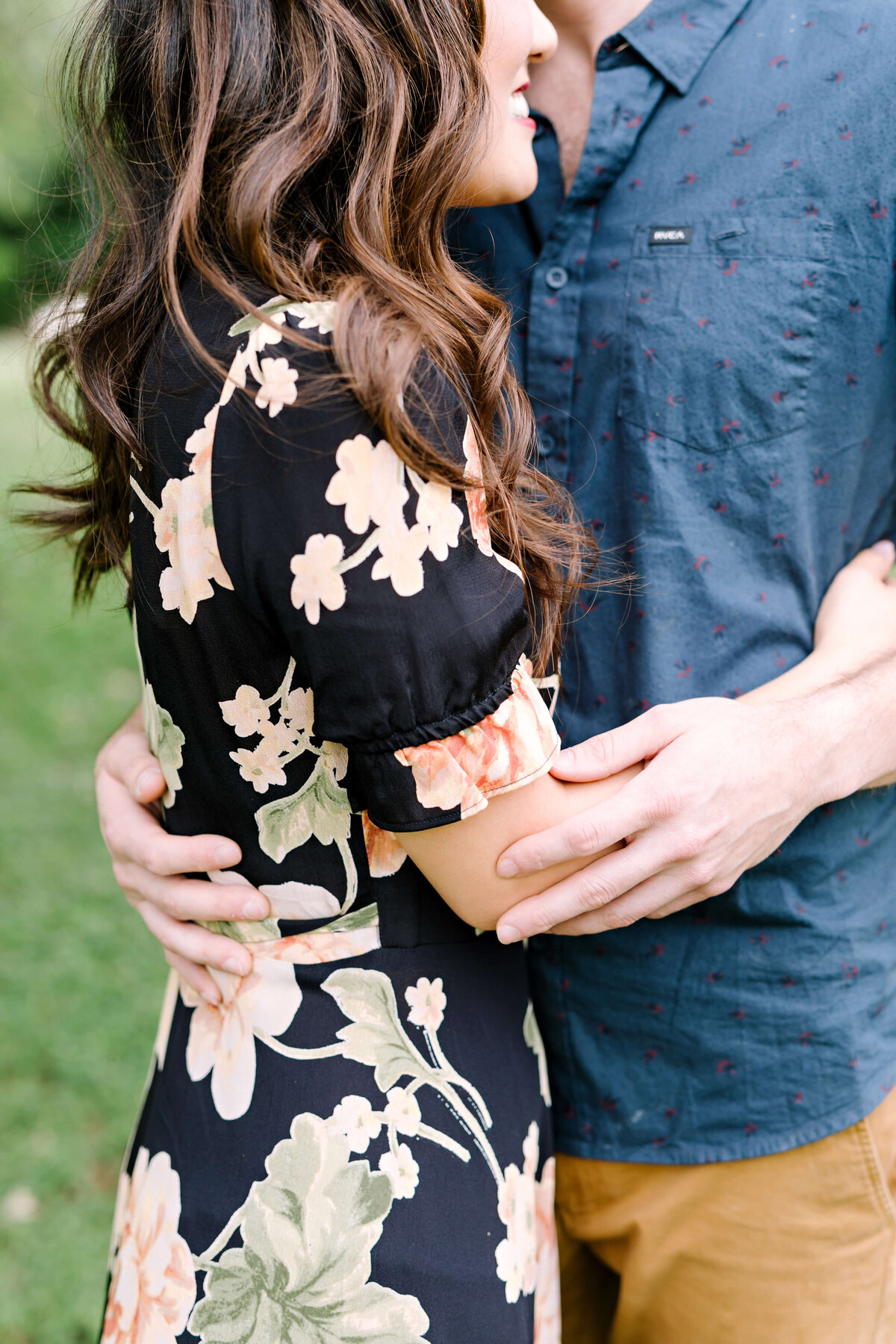 Couple embracing at an engagement session