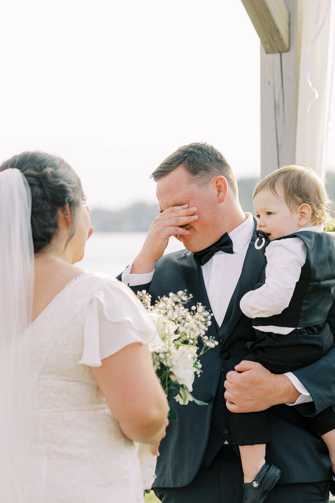groom-cries-as-he-sees-bride