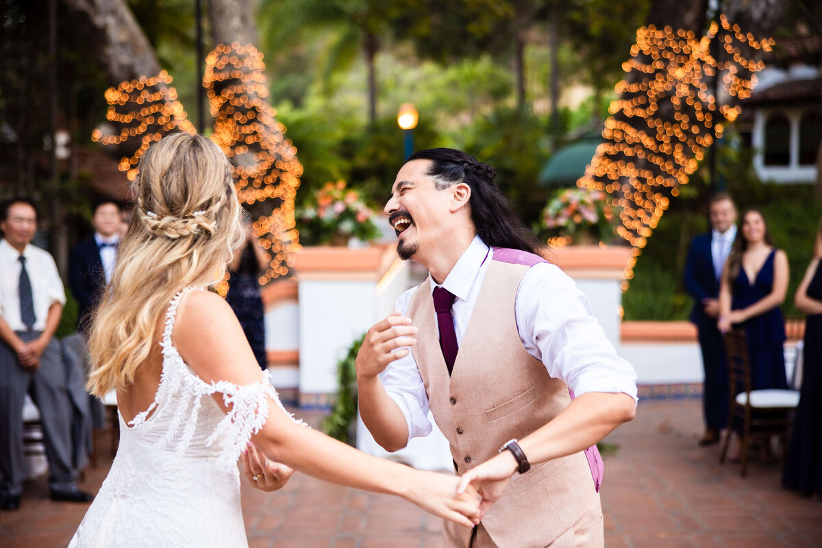 Bride and groom dancing at wedding in Southern California