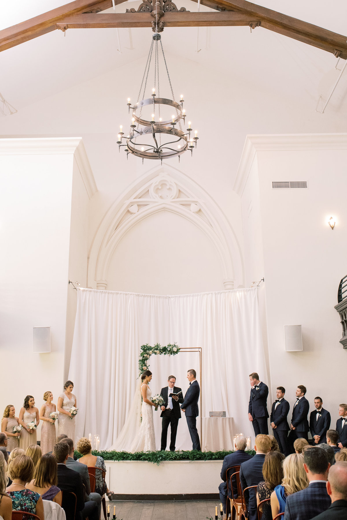 Wide shot of a wedding ceremony taking place at the Transept OTR in Cincinnati, OH