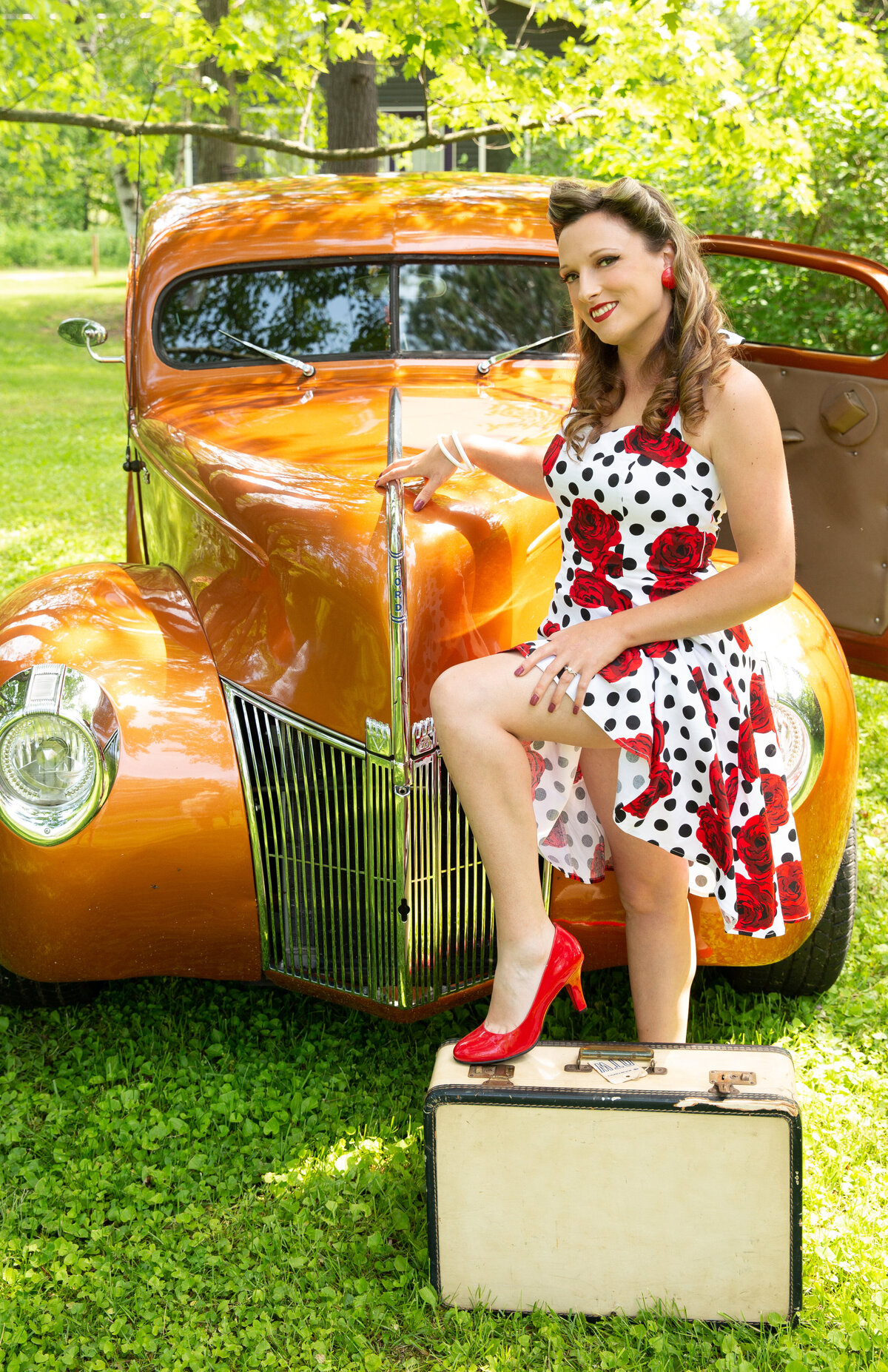 goddess studio boudoir woman pinup special pinup style old suitcase red heels red roses dress old ford pickup