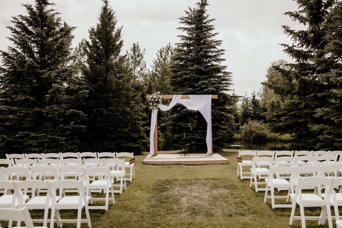Pine & Pond, a natural picturesque wedding venue in Ponoka, AB, featured on the Brontë Bride Vendor Guide.