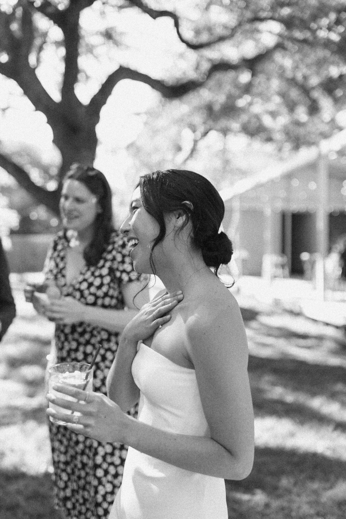 Bride chatting with guests at Mattie's wedding venue in Austin