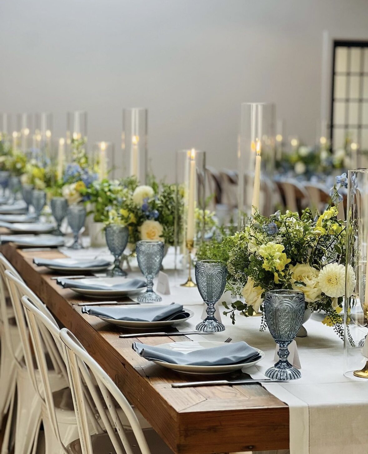 Wedding reception table with green and blue decor