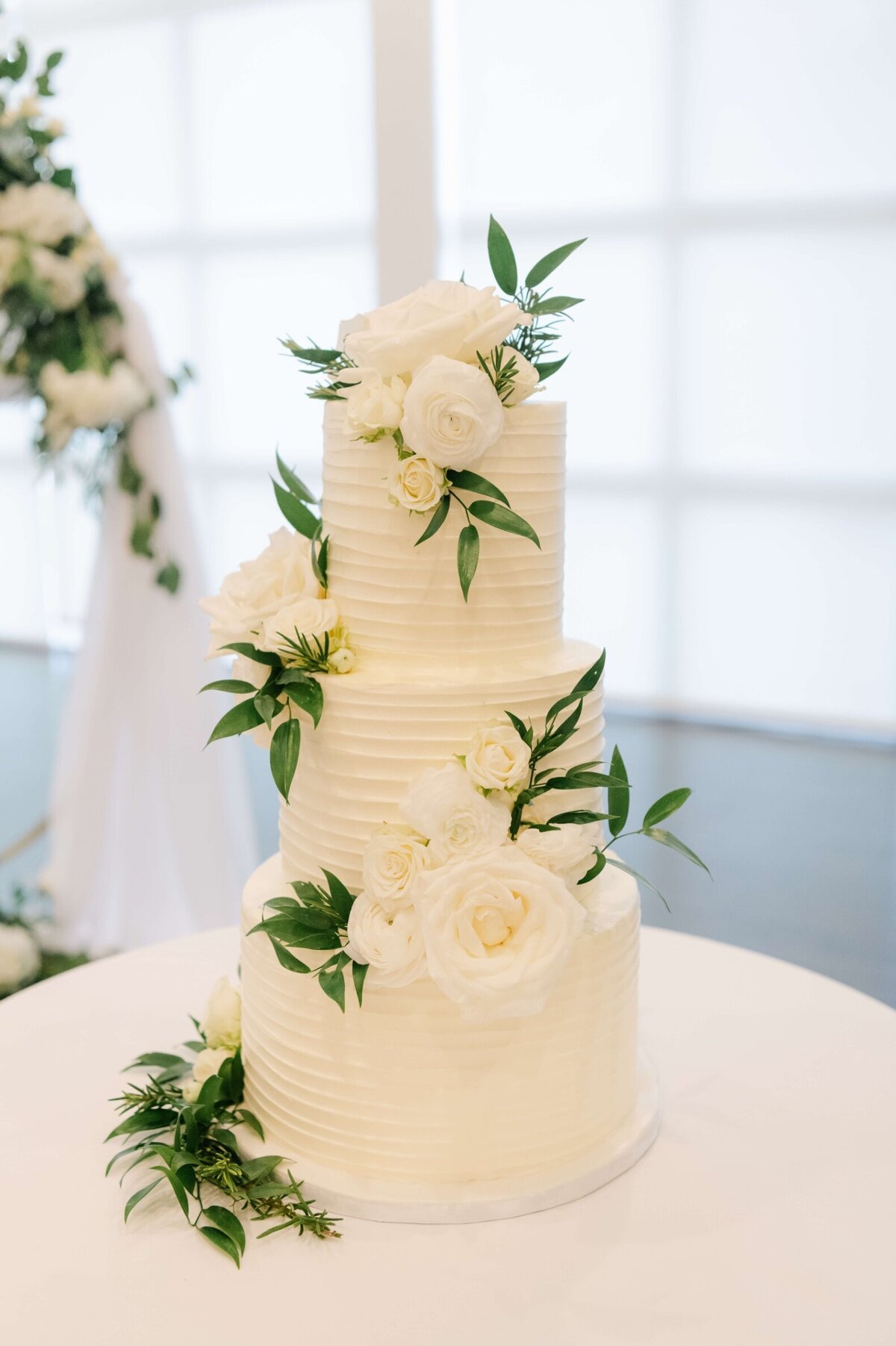 White Wedding Cake with Greenery