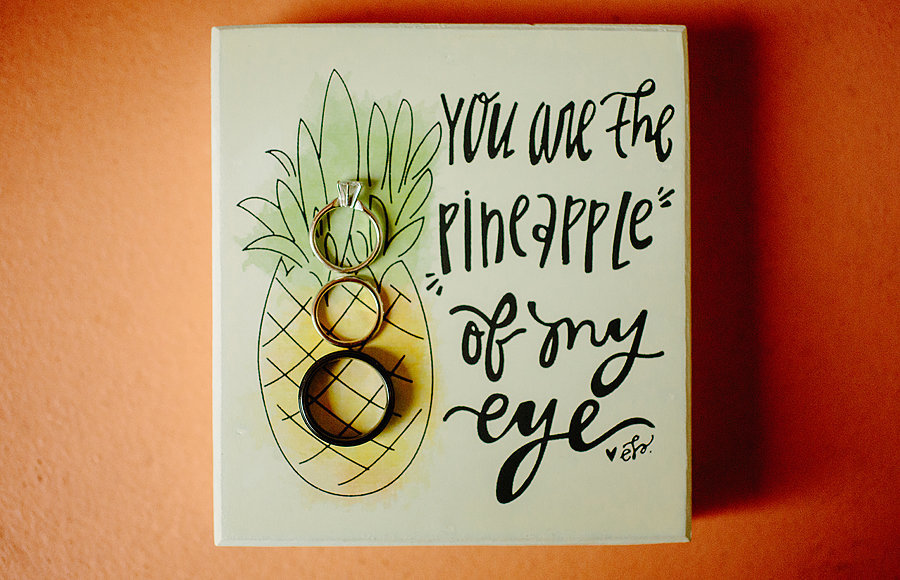 river palm cottages wedding, pineapple signs with rings