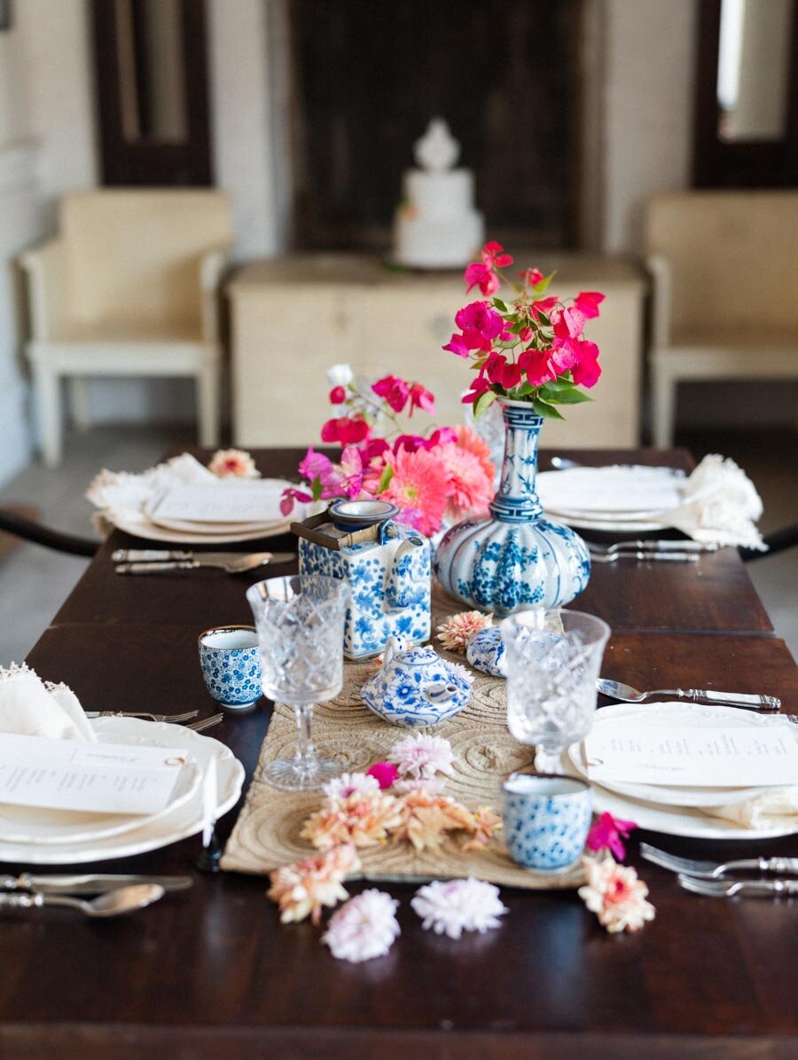 Bougainvillea Centerpiece in Blue and White Ginger Jars Indian Wedding Photographer Bonnie Sen Photography