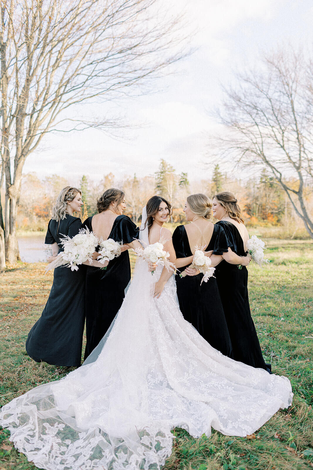bride-and-bridesmaids-in-black-dresses