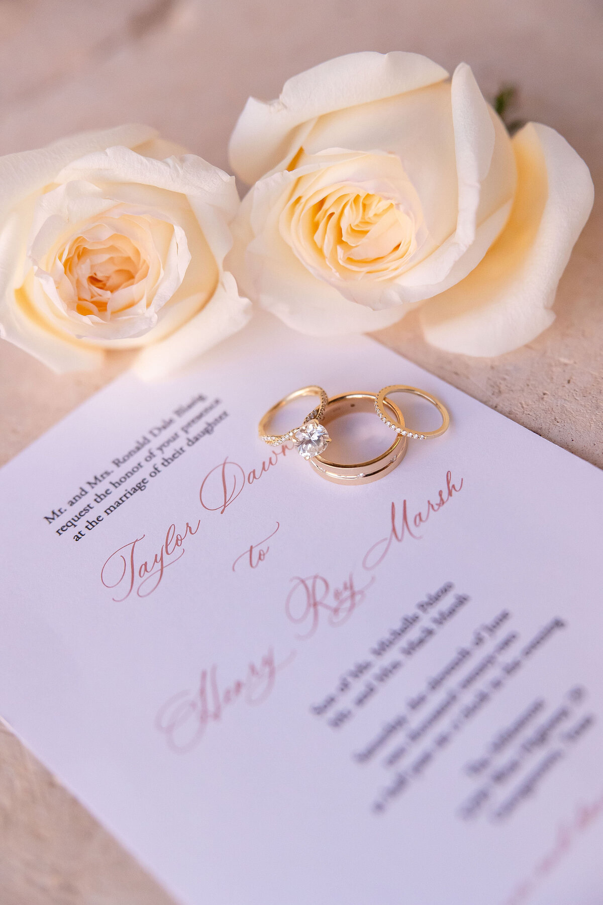 rings invitation and cream roses for wedding at Milestone Georgetown Texas by Firefly Photography