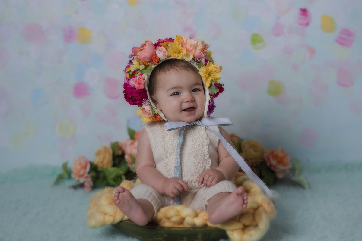Cute baby photos in floral bonnets