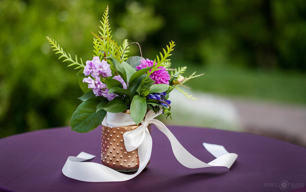 Boulder Wedding photographer cocktail table with purple linens and florals for a summer wedding at Wedgewood Weddings on Boulder Creek