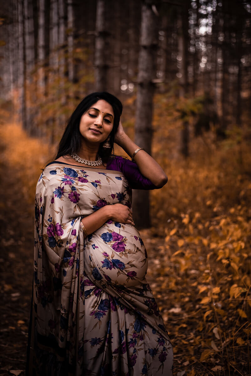 Pregnant mother in saree posing for Toronto maternity photographer
