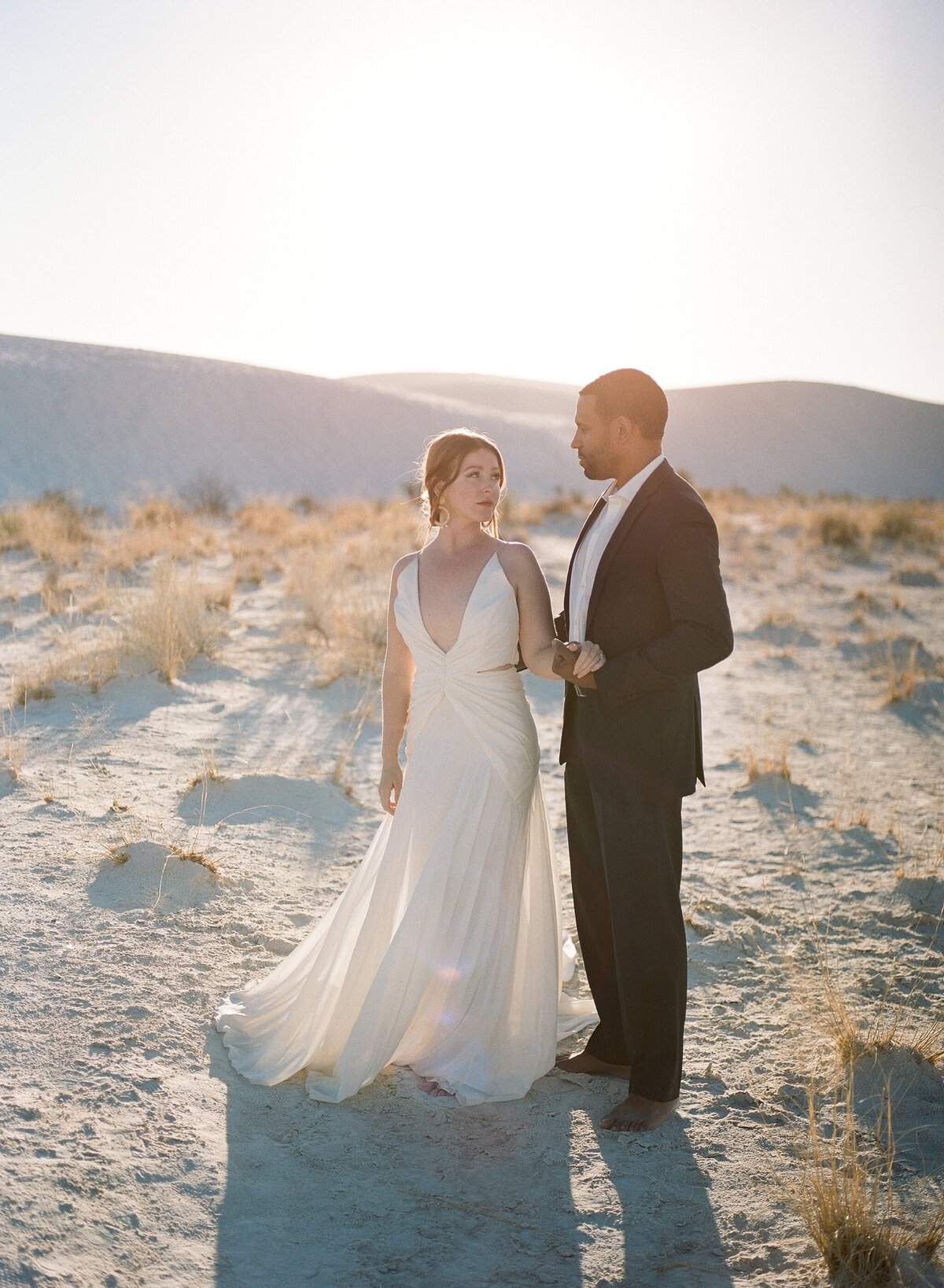 Couple in white in white sands formal photo