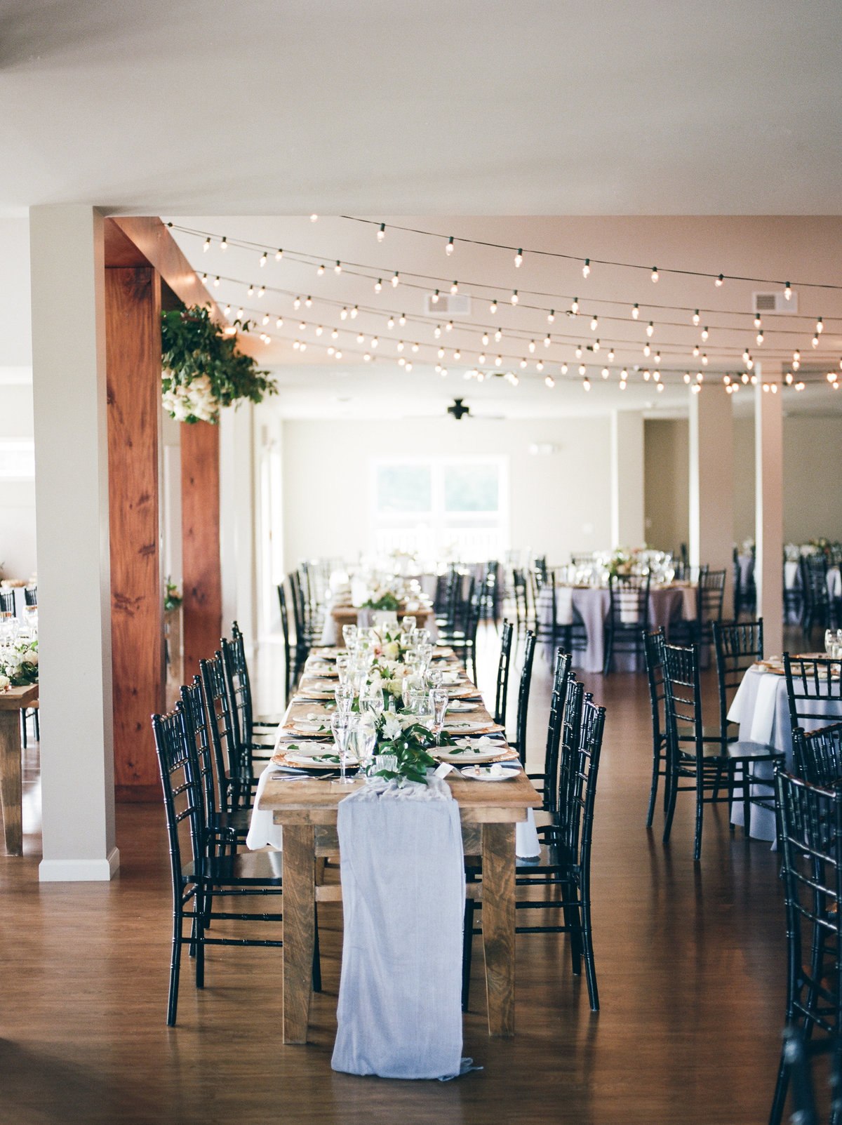 long reception tables with table runners at philadelphia wedding