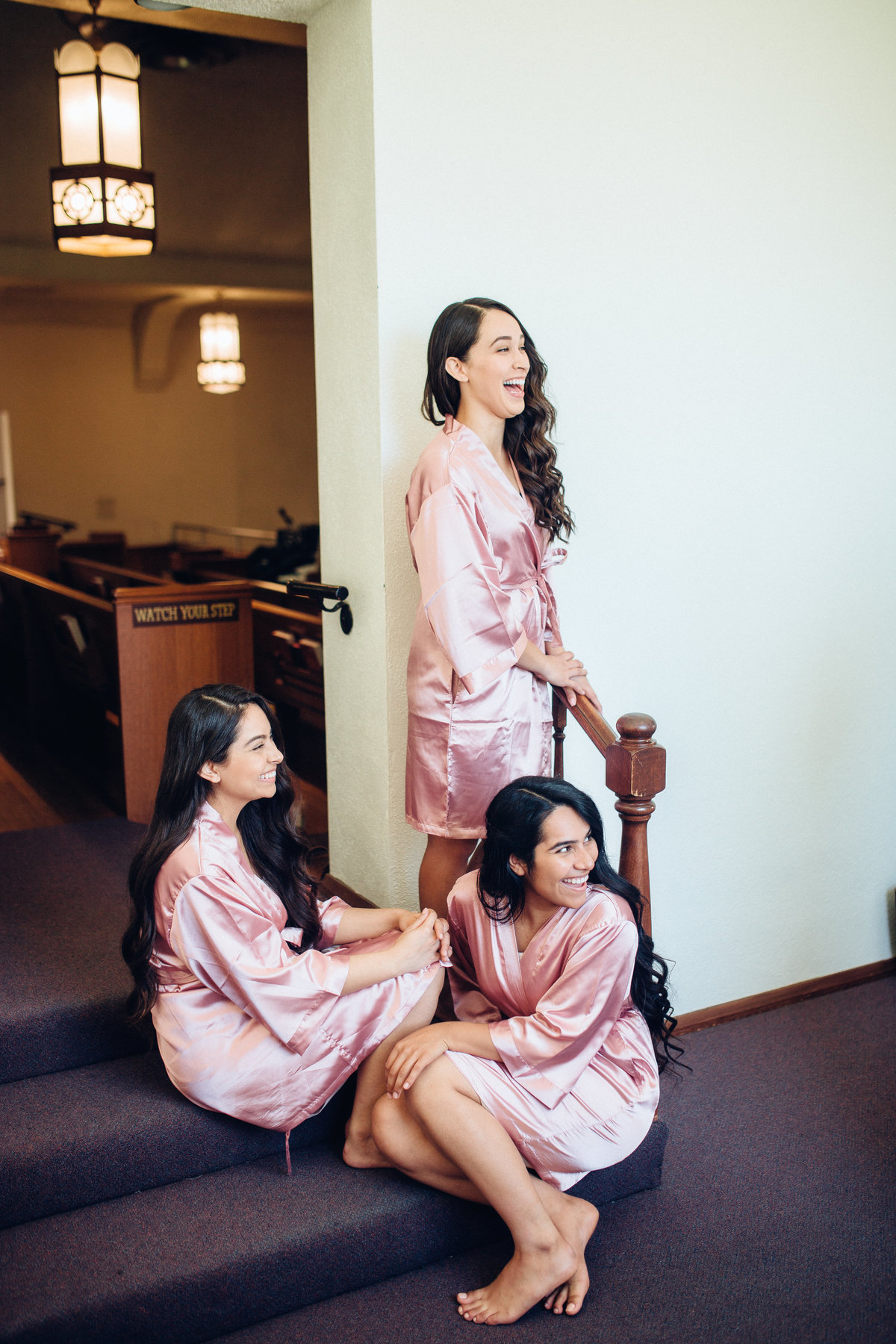 Wedding Photograph Of Three Women in Pink Robe Laughing Los Angeles