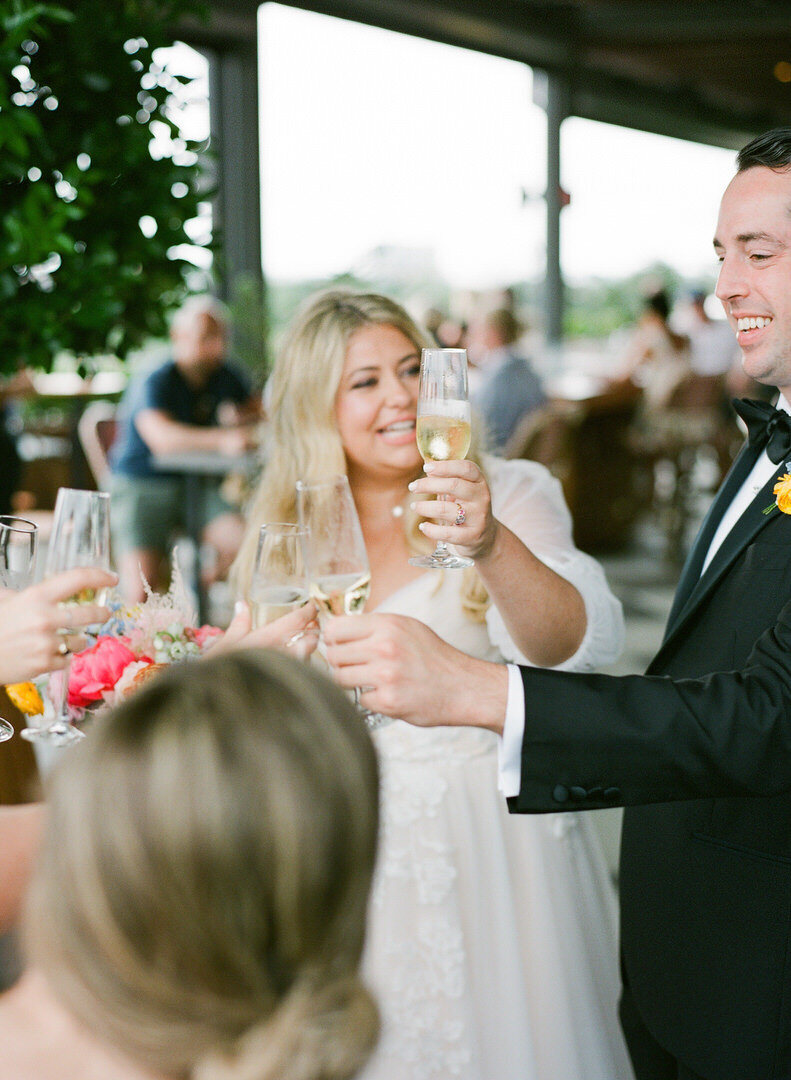 Bride and Groom Toasting with Champagne Photo