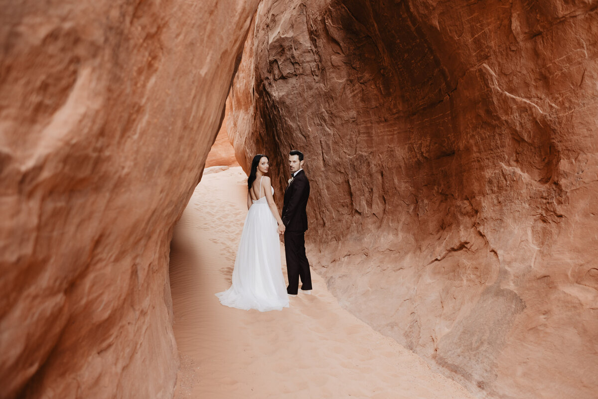 Utah elopement photographer captures couple walking away