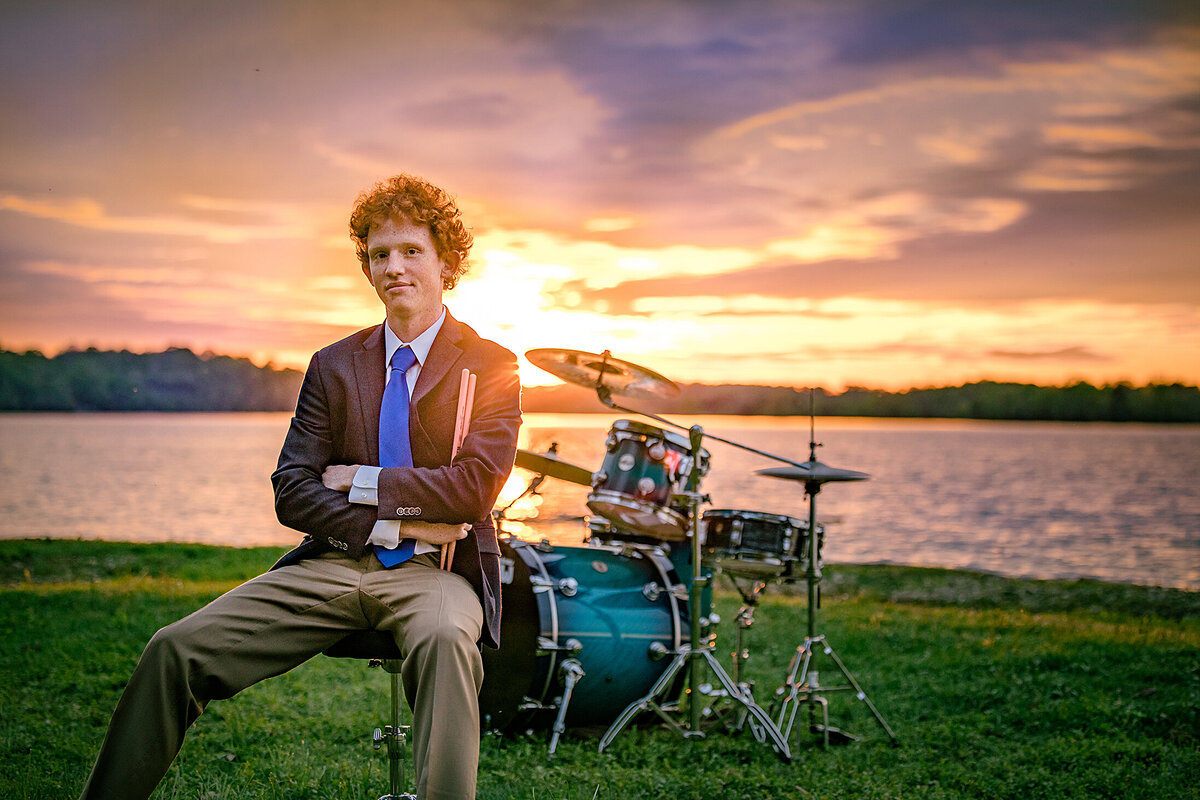 karen-halbert-photography-senior-boy-drums-sunset-lake