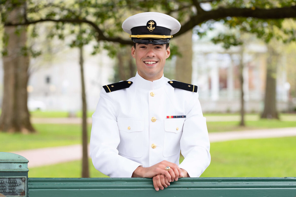 Senior portrait in Annapolis Maryland with the sailor in whites on Naval Academy Stribling walk.