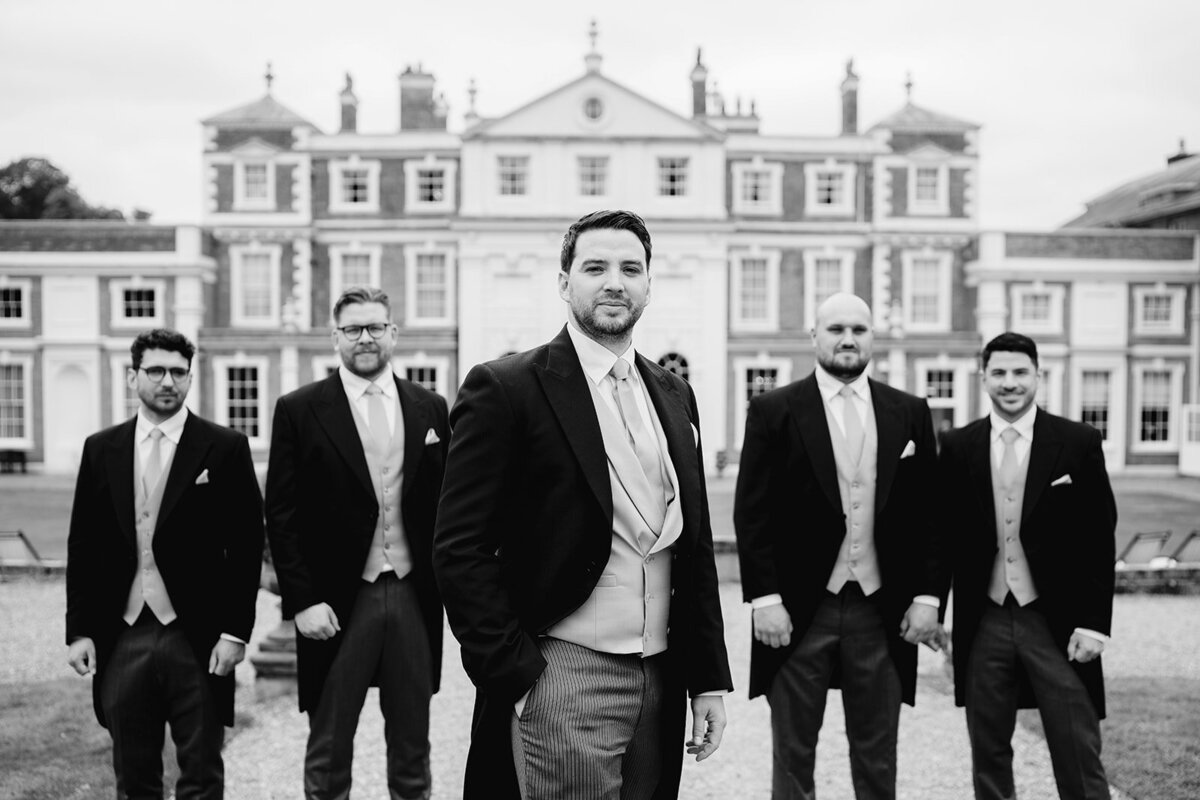 black and white photo of the groomsmen at hawkstone hall