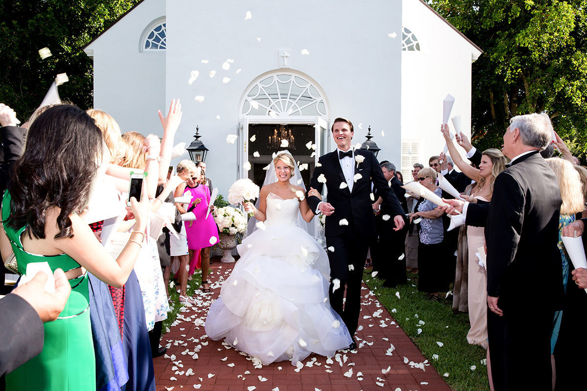 trinity by the cove naples florida bride and groom leaving church