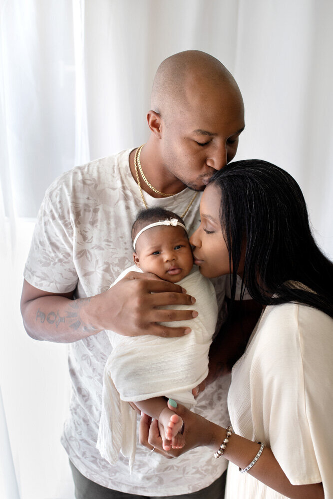 Newborn session of baby girl with parents