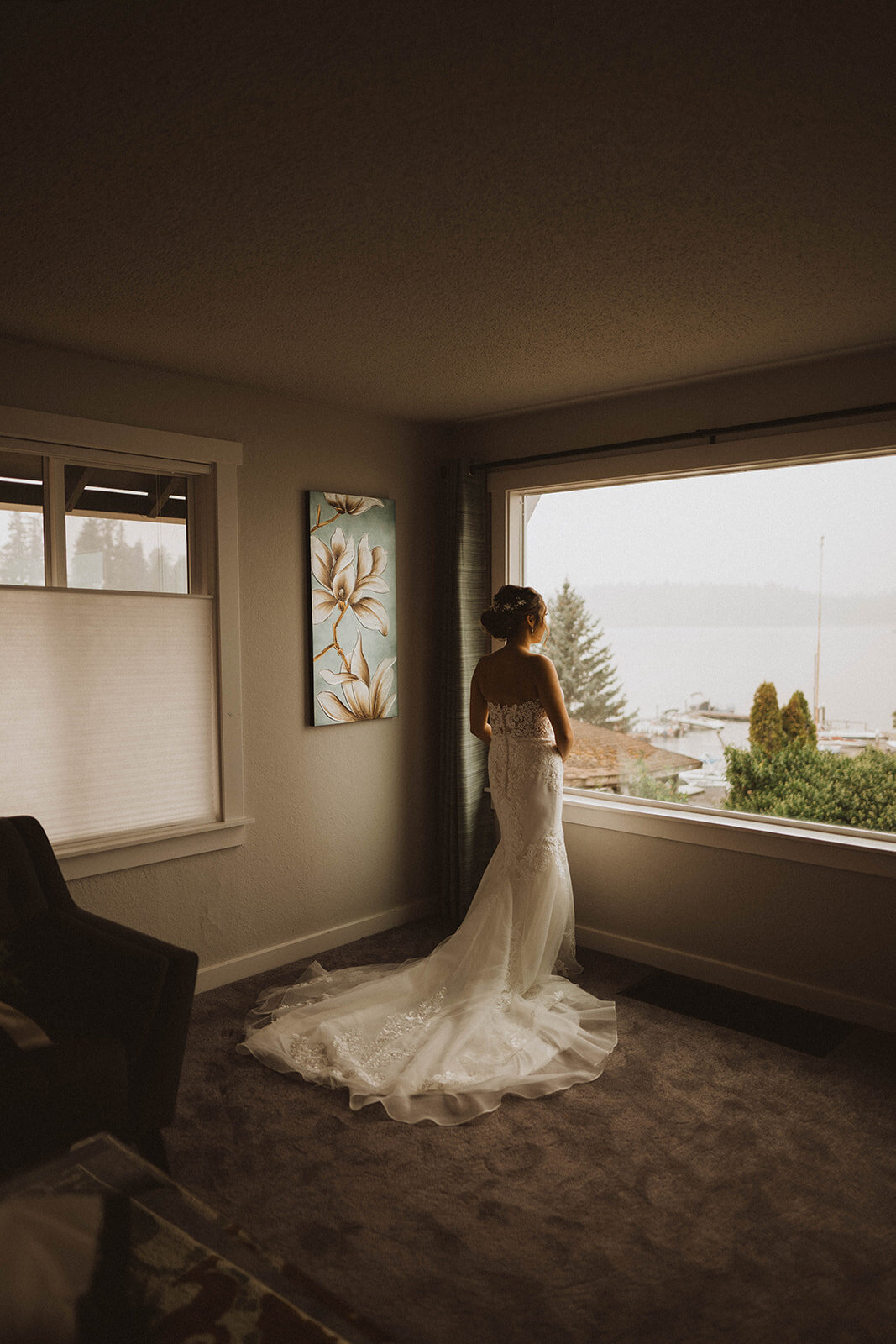 Bride looks out onto the lake during her Seattle elopement
