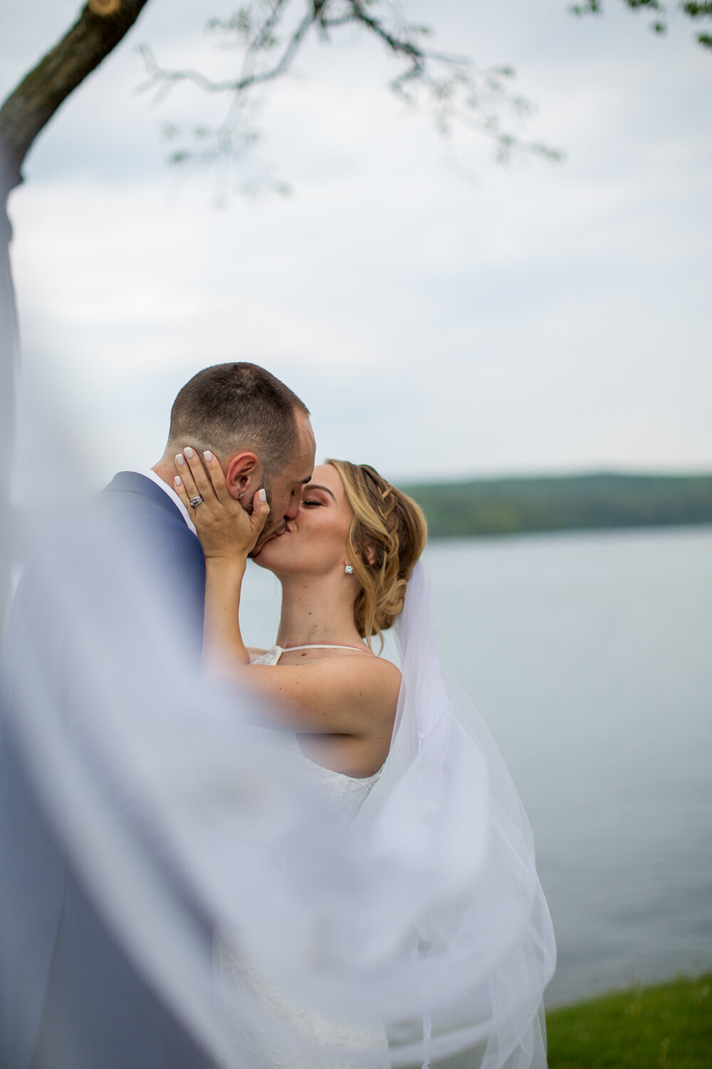 New England wedding bride and groom kissing