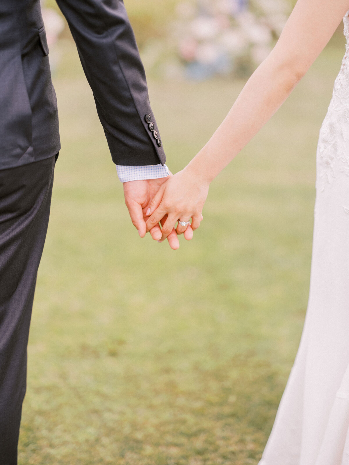 holding-hands-wedding-bride-groom