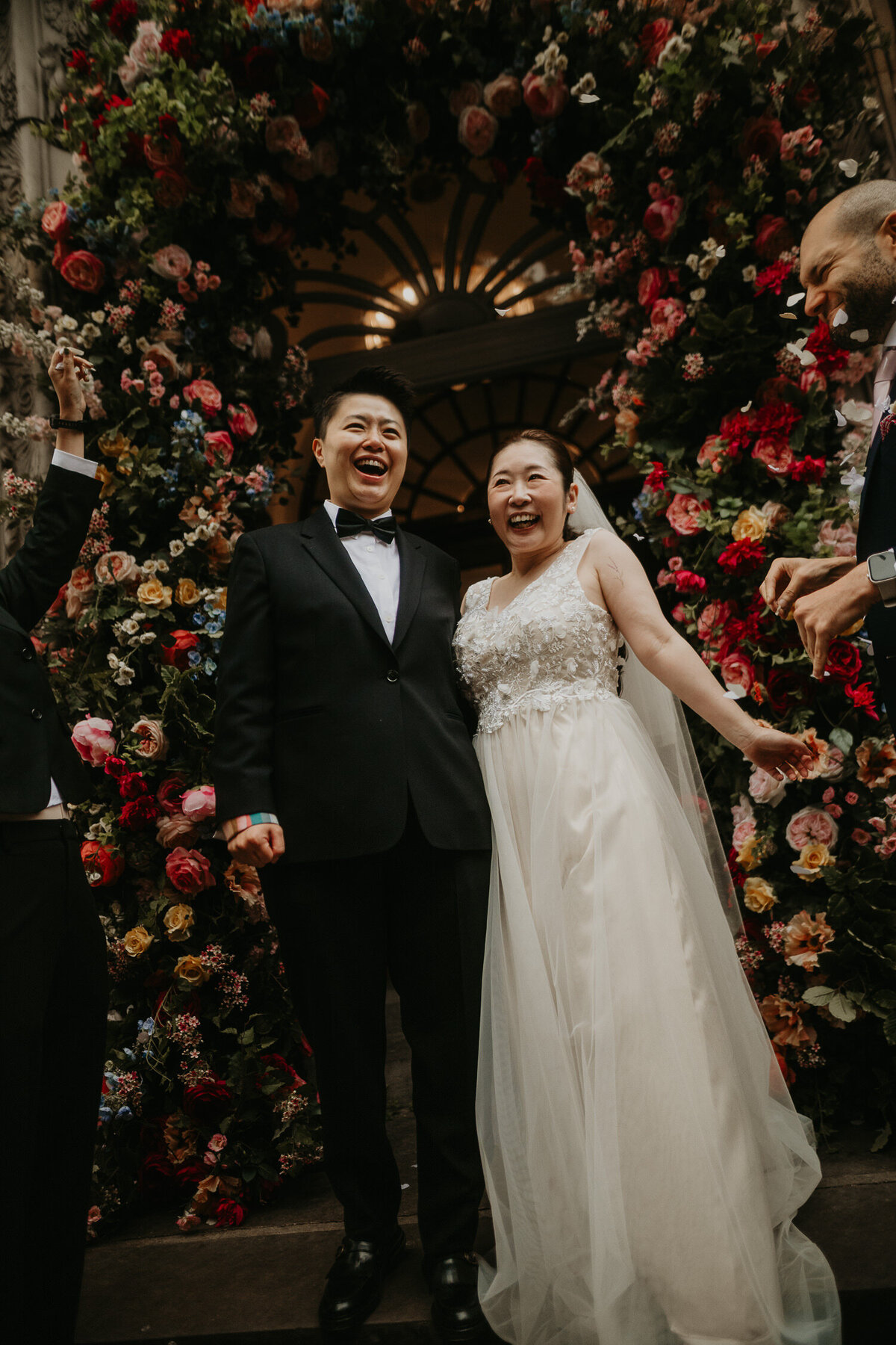 Same Sex Couple exit Chelsea Tow Hall after their wedding ceremony.