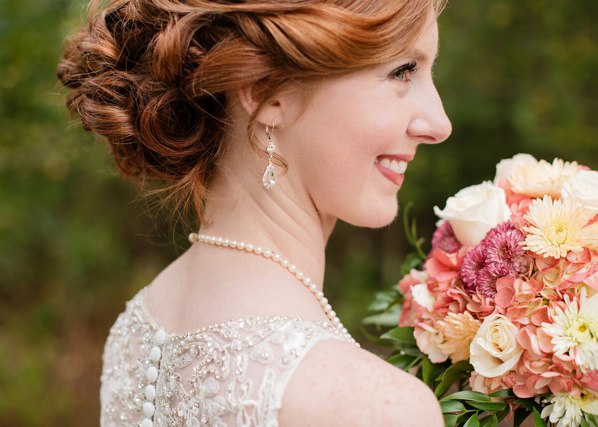 side profile of red head bride smiling