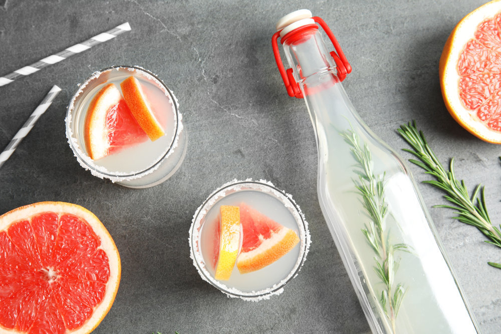 Specialty cocktails made with grapefruit & herb infused simple syrup